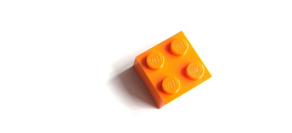 Orange square Lego brick.