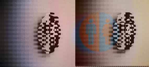 black and white male, female toilet sign.