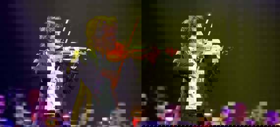 Soloist playing a violin.